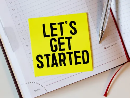 Let's Get Started note on a dayplanner