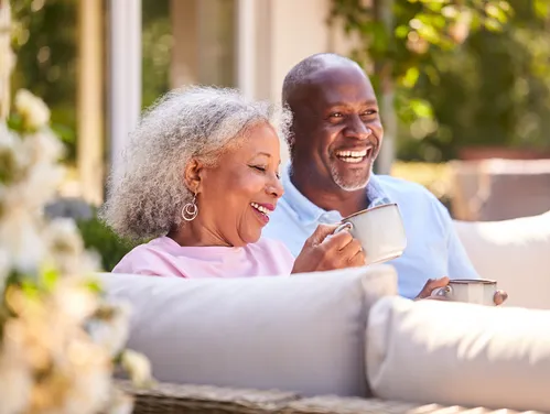 older couple sitting outside