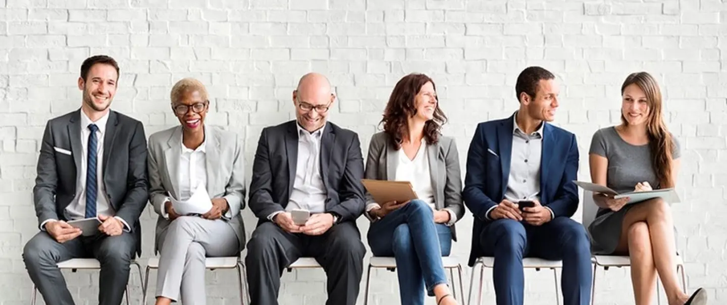 various employees sitting together